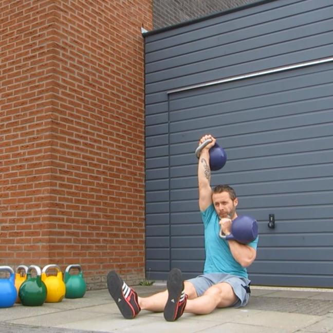 Kettlebell Alternate Seated Press